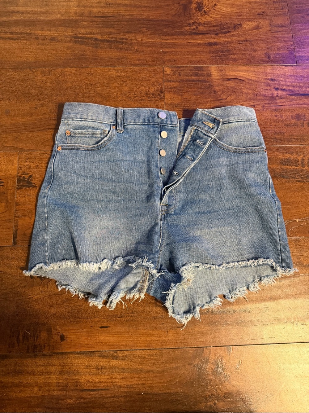 High-Rise Frayed Hem Denim Shorts in Light Blue
